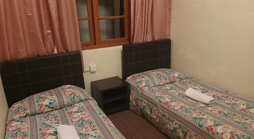טאנה ראטה Dew Drop Inn מראה חיצוני תמונה